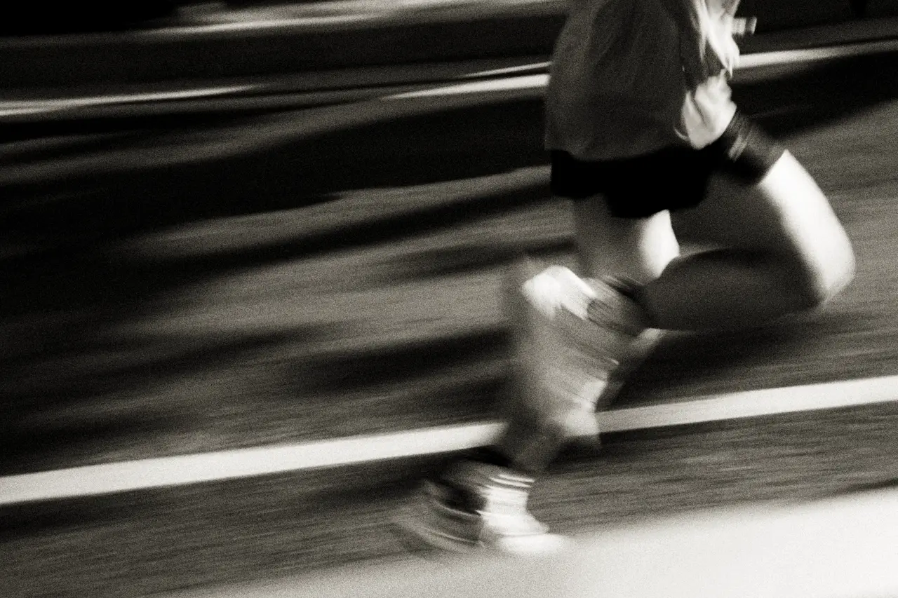 Toronto Waterfront Marathon course guide: a runner on a city street