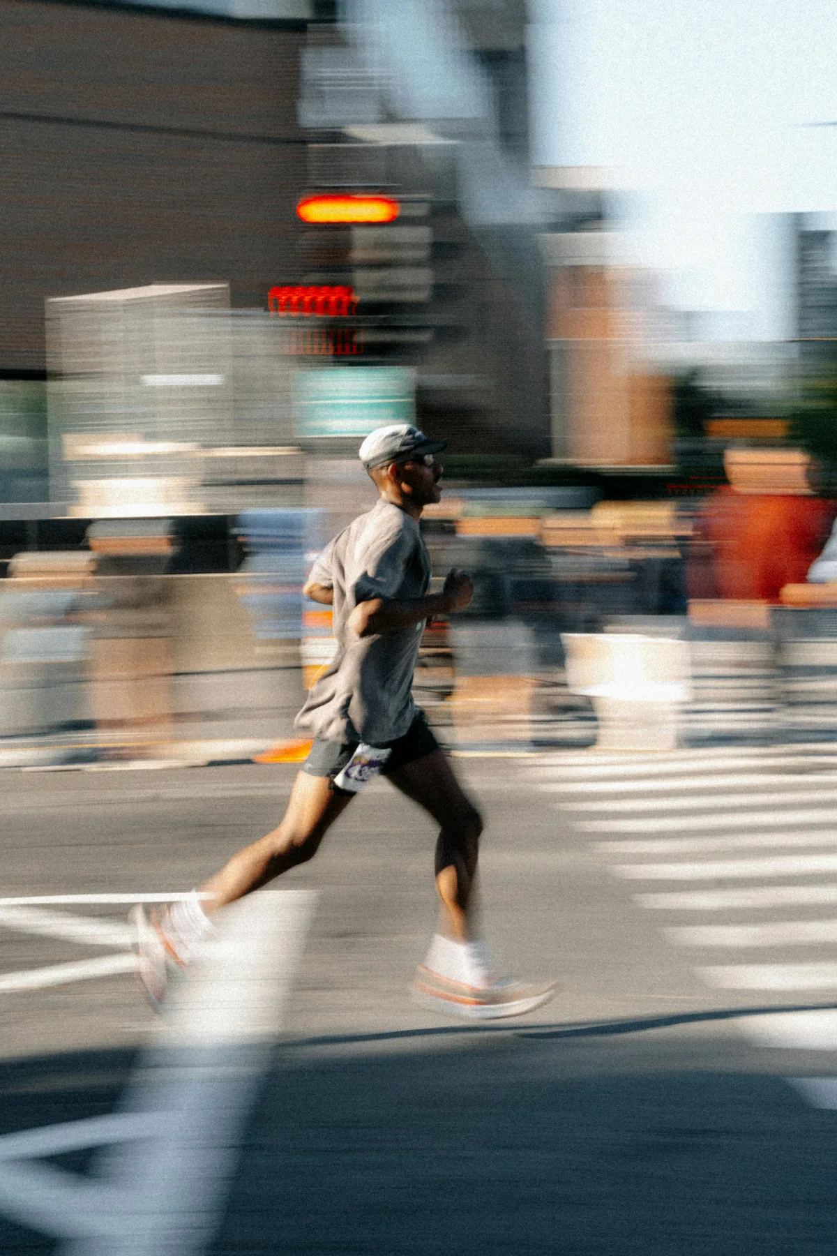 Runner moving through a city street