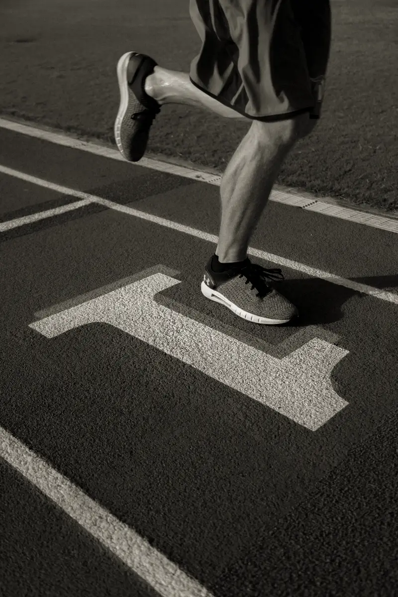Runner striding on a track